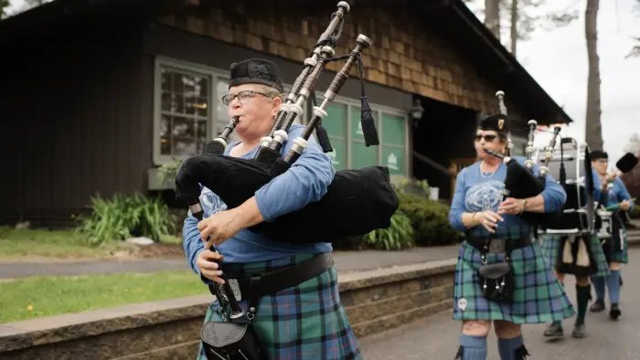 woman playing bagpipes